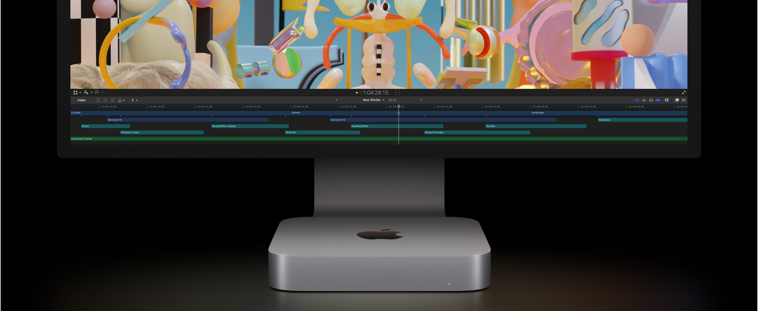 Vorderansicht des Mac mini mit Studio Display, auf dem ein Videoprojekt in Final Cut Pro bearbeitet wird.